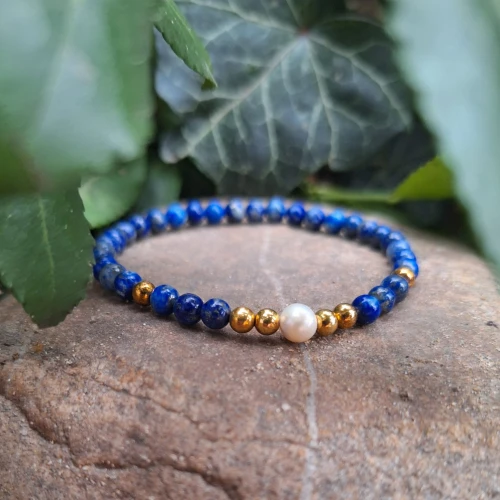 Lapis lazuli, perełka słodkowodna i pozłacane srebro - bransoletka na gumce
